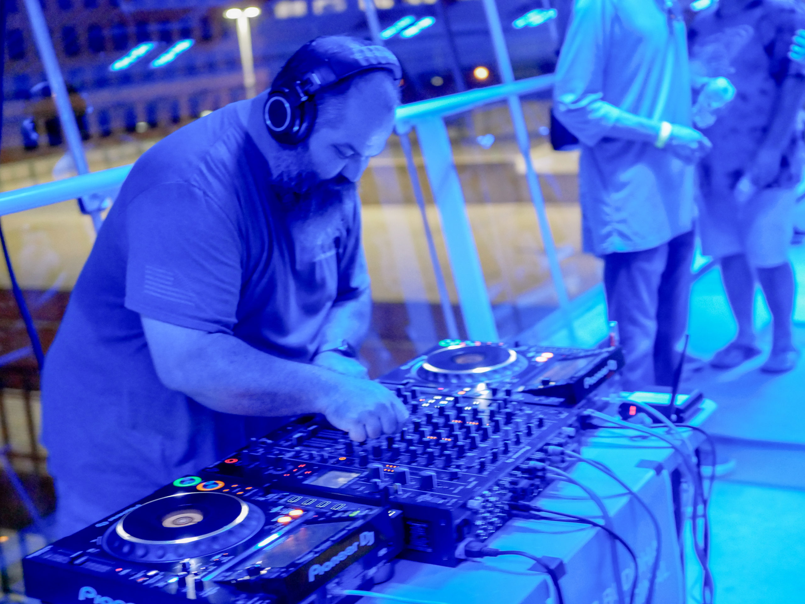 DJ Buddha performing in the Skybridge during Alternating Currents' silent disco.