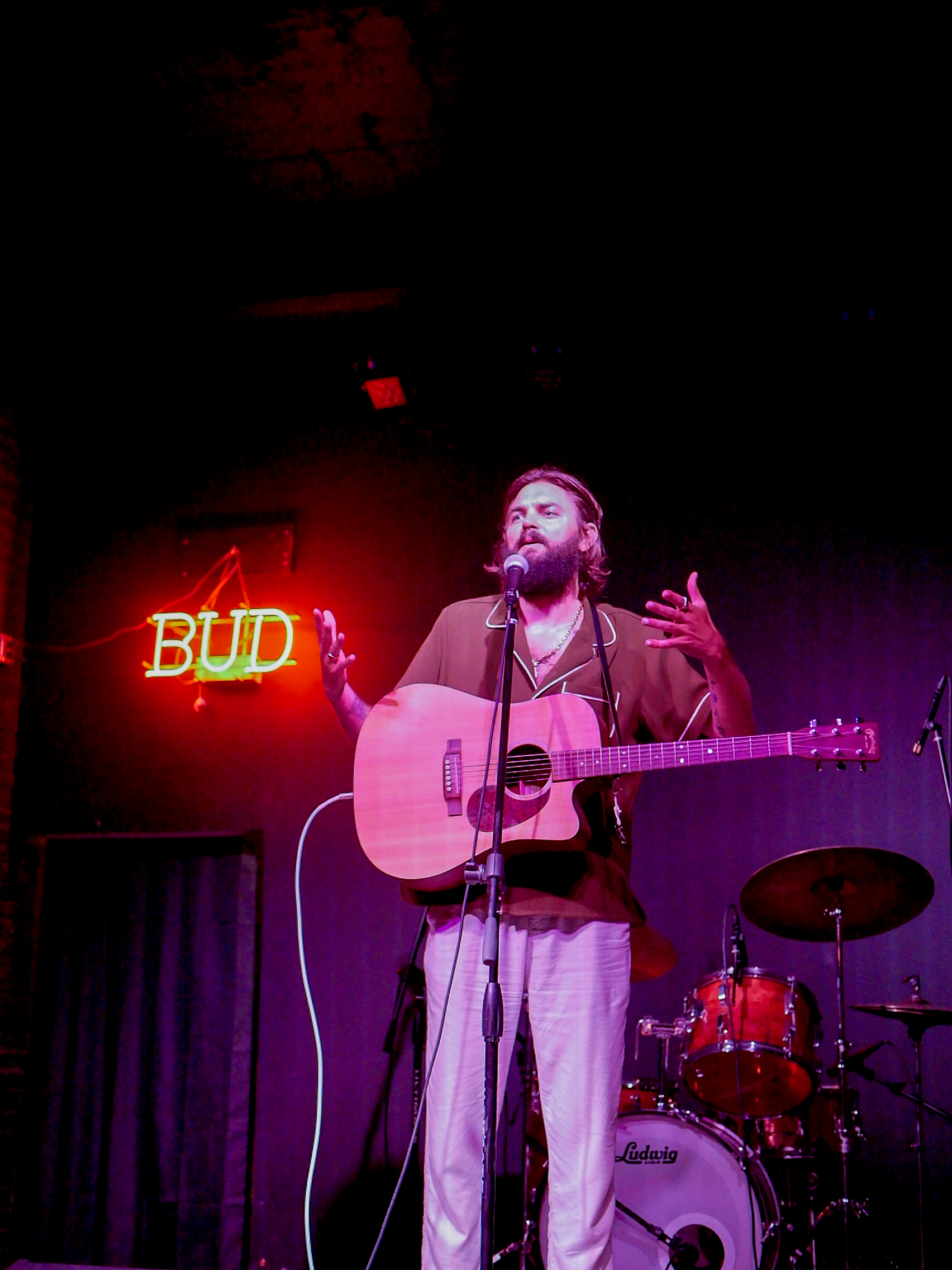 Nick Thune performing a surprise set at the Raccoon Motel during Alternating Currents.